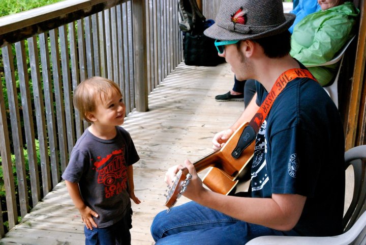 Daniel, serenading one of our youngest community members.